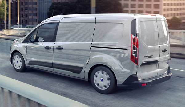 Transit Connect Cargo Van being driven on a road in the city