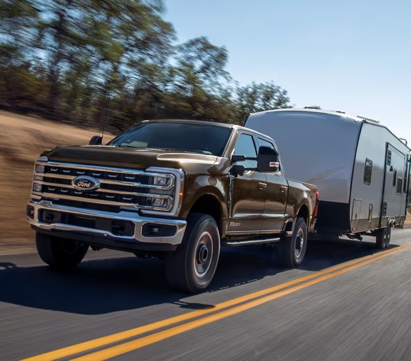 2024 Ford Super Duty® F-350® LARIAT® model pulling a trailer